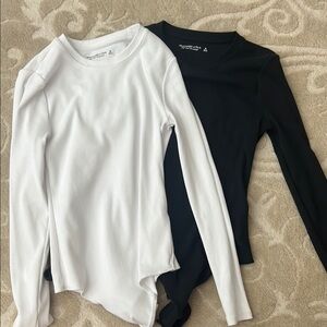 White and Black Long Sleeve Bodysuits